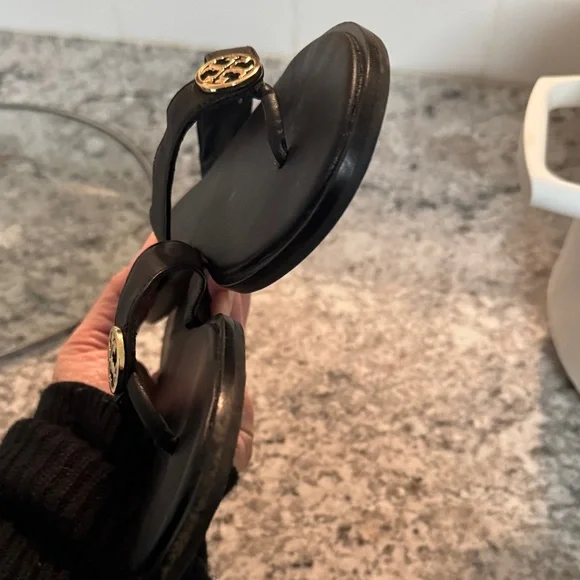 Tory Burch Black Flip Flops with Gold Emblem - Picture 7 of 7